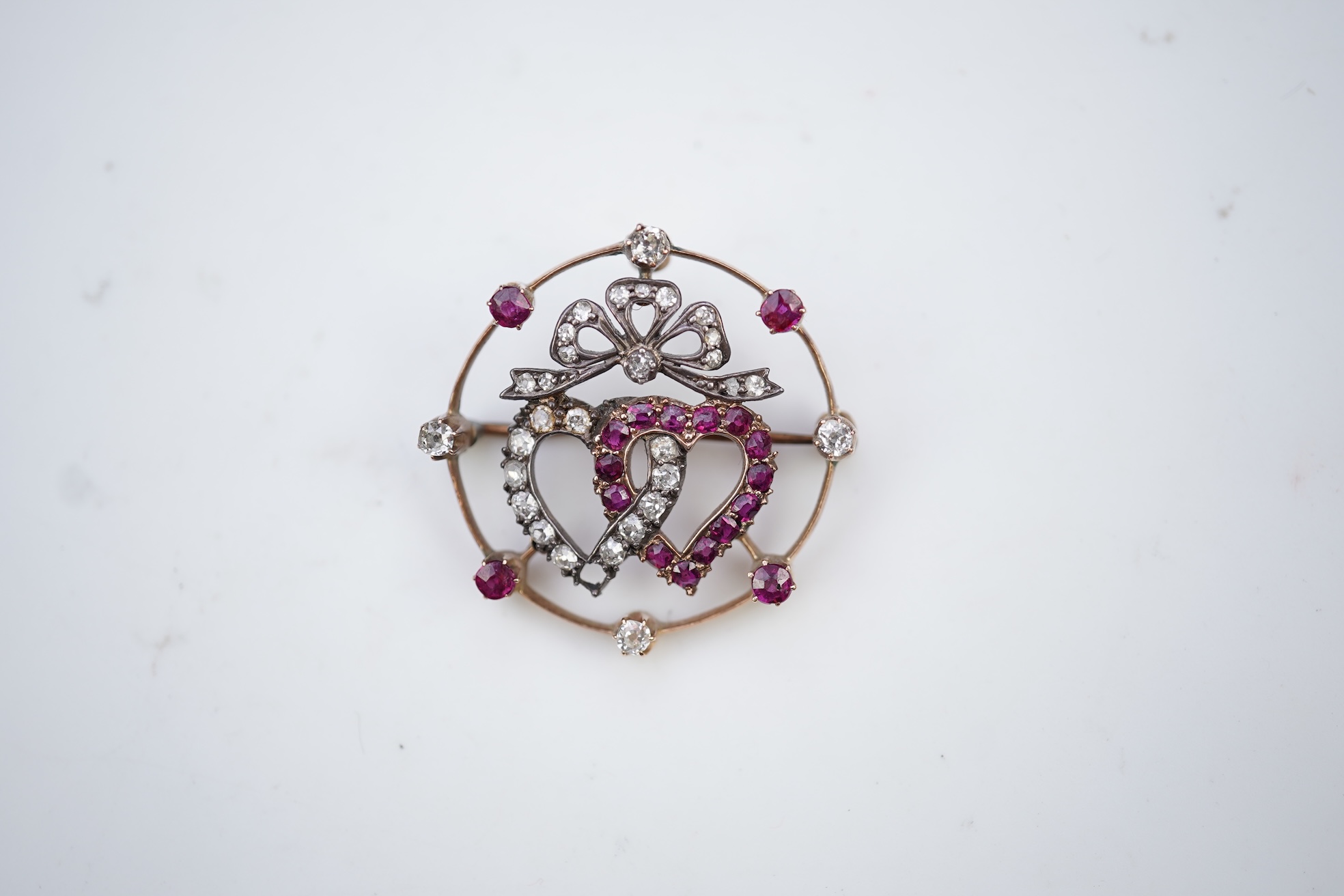 A ruby and diamond brooch, circa 1900